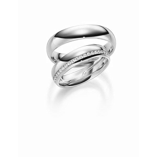 Eksklusive Gerstner vielsesringe i 14 eller 9 karat hvidguld med 21 diamanter – blanke ringskinner, 5 mm brede.